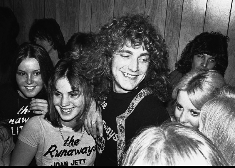 Robert Plant with The Runaways (Lita Ford, Joan Jett and Cheri Curry) in dressing room after their show at The Starwood Hollywood, CA - 1976; Various Locations; Mark Sullivan 70's Rock Archive (Photo by Mark Sullivan/Contour by Getty Images)
